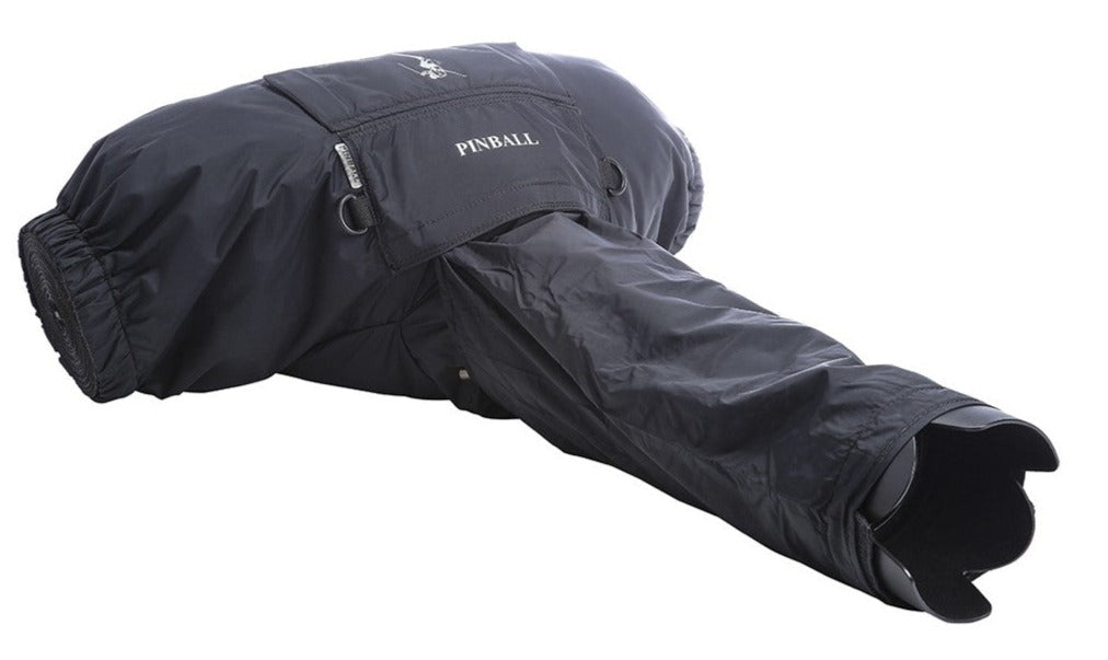 Image: A camera with a telephoto lens covered by the P20 H2O Suraksha rain protector, demonstrating its extended folded pouch providing additional coverage and protection for long lenses. The rain protector ensures your camera and telephoto lens stay dry and shielded from the elements, enabling you to capture exceptional photos even in challenging weather conditions.