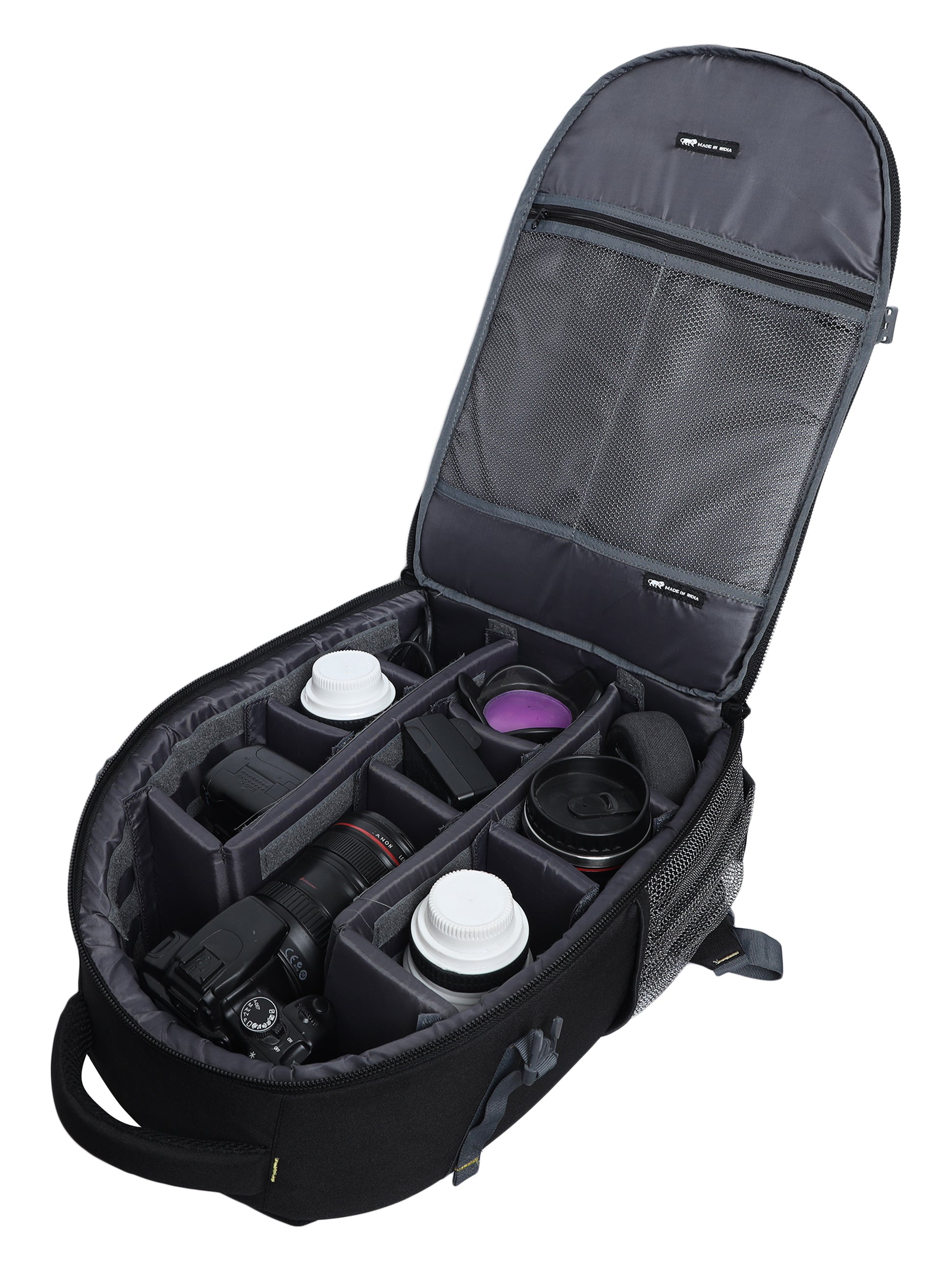 Open view of 'The Game Changer' camera bag from the Pinball Game series, revealing its well-organized compartments and neatly arranged camera and accessories. The bag offers dedicated slots for the camera body, lenses, memory cards, and other essentials, ensuring easy access and efficient storage. The vibrant interior lining adds a touch of style to the practicality of the bag, making it an ideal choice for photographers seeking functionality and aesthetics.