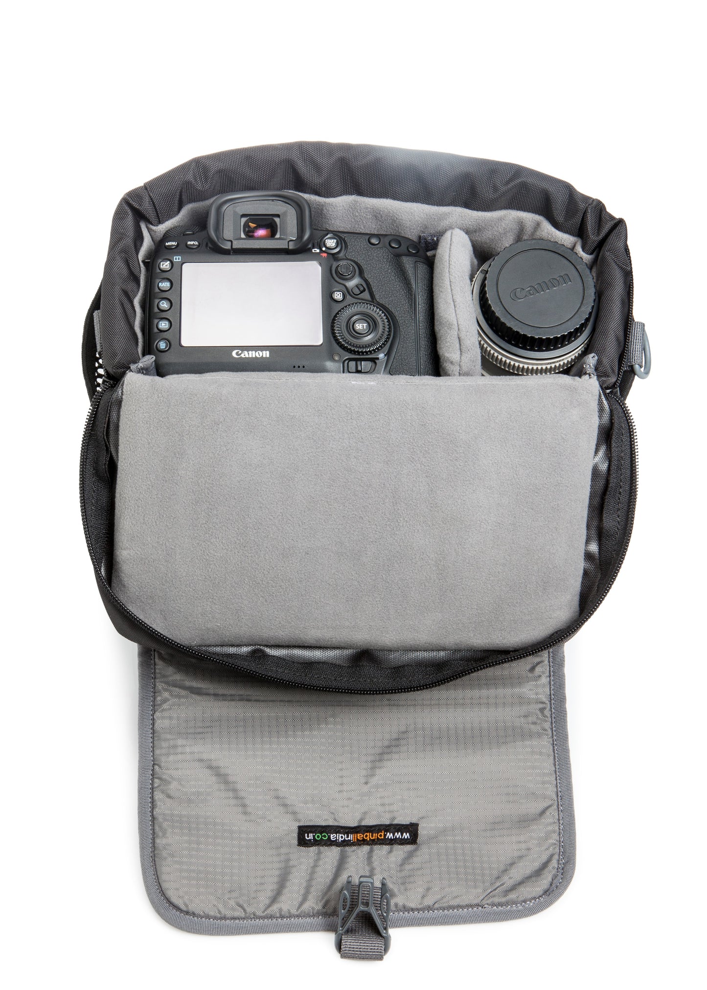 Image: Top view of the P28 PNX DSLR camera bag, showcasing its open configuration with a camera and equipment neatly organized inside. The compact bag provides versatile storage for a camera, lens, and additional accessories, ensuring easy access and efficient organization during photography sessions.