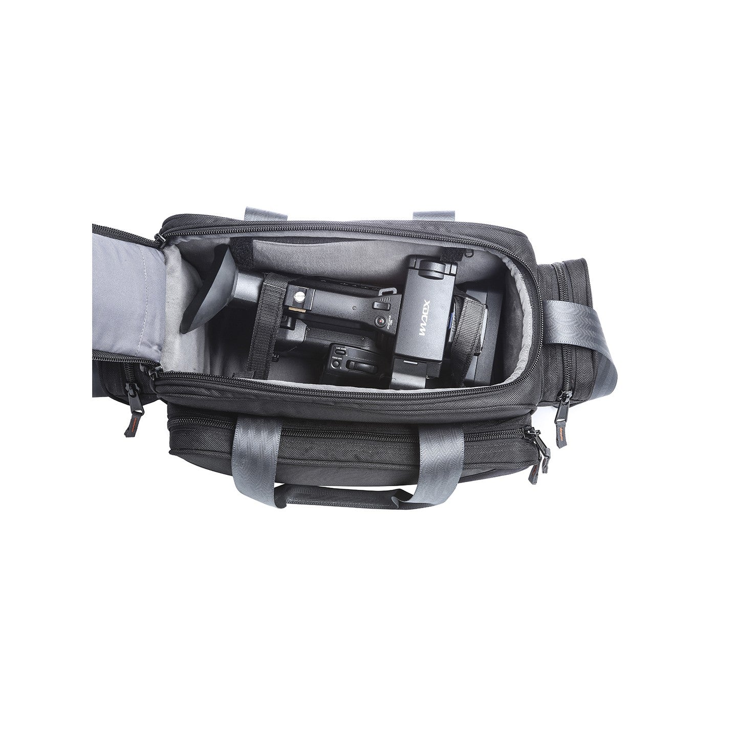Image: Top view of the P43 Video Basic sling video camera bag, showcasing its interior loaded with a video camera and accessories. The bag's compact design and dedicated compartments ensure secure and organized storage for videography gear. Stay ready to capture stunning footage with the P43 Video Basic.